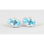 A PAIR OF TOPAZ AND DIAMOND EARRINGS, 5.6CTS, set in 18ct white gold.