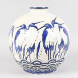 A LARGE FRENCH POTTERY VASE decorated with blue penguins. 11.5ins high.