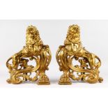 A SUPERB LARGE PAIR OF 18TH-19TH CENTURY FRENCH GILT BRONZE CHENETS of large imposing lions, along