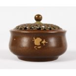 A SMALL CHINESE BRONZE GOLD SPLASH CENSER AND COVER. Impressed mark. 3ins diameter.