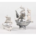 TWO MINIATURE NOVELTY SILVER SAILING BOATS.