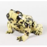 A GOOD STONE FROG with glass eyes. 5.5ins high.