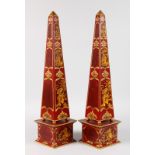 A GOOD PAIR OF TOLEWARE OBELISKS with Chinese decoration. 22ins high.