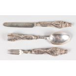 A THREE PIECE VICTORIAN CHRISTENING SET in a fitted case, knife, fork and spoon. Birmingham 1850.