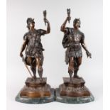 VAGGEN A GOOD LARGE PAIR OF BRONZE SOLDIERS carrying a sword and axe with flaming torch, standing on