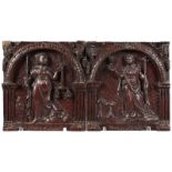 A GOOD PAIR OF 17TH CENTURY CARVED OAK PANELS, depicting two figures and inscription in Latin