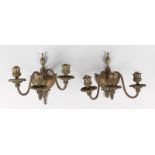 A PAIR OF SMALL OXIDISED THREE-LIGHT WALL SCONCES.