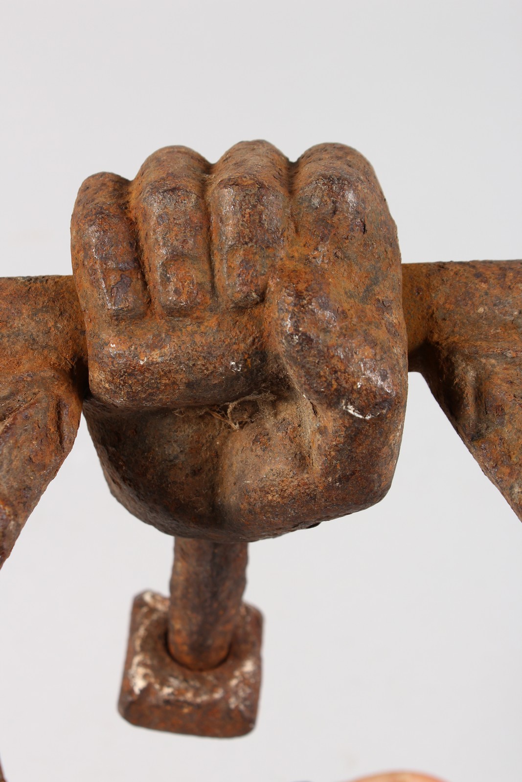 A CAST IRON CLENCHED FIST DOOR KNOCKER. - Image 3 of 3