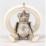 A SILVER TEDDY BEAR TEETHING RING.