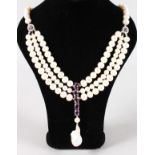 A SILVER, AMETHYST, PEARL AND BAROQUE PEARL NECKLACE.