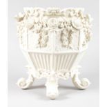 A LARGE BELLEEK JARDINIERE of circular octagonal design, with panels of flowers, birds and flower