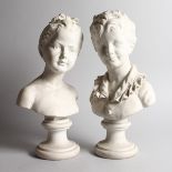 A PAIR OF FRENCH PARIAN BUSTS OF A YOUNG BOY AND GIRL on pedestal bases. 16ins high.