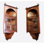 A GOOD PAIR OF EDWARDIAN MAHOGANY INLAID CORNER CABINETS with open shelves above a glazed door