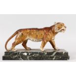 A GOOD VIENNA BRONZE TIGER on a rectangular marble base, Tiger 13ins long.