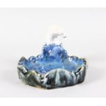 A ROYAL DOULTON STONEWARE ASHTRAY as a polar bear sitting on a rock overlooking a pool. 5.5ins