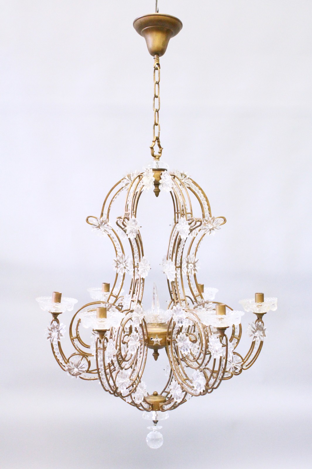 A DECORATIVE WROUGHT BRONZED METAL AND MOULDED GLASS SIX BRANCH CHANDELIER. 3ft 0ins high x 2ft 4ins