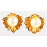 GARRARD & CO YELLOW GOLD SHELL AND PEARL EARRINGS.