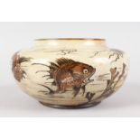 A GOOD MARTIN BROTHERS CIRCULAR BOWL, decorated with grotesque fish. 7ins diameter. Incised Martin