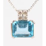 A LOVELY 14CT WHITE GOLD, AQUAMARINE AND DIAMOND SET PENDANT AND CHAIN.