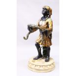 A PAINTED AND GILDED NUBIAN FIGURE STAND holding a snake. 4ft high.