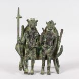 AN EARLY AFRICAN BRONZE GROUP, WARRIOR AND WOMAN SEATED ON A SEAT, calligraphy on reverse AMT. 4.