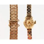 A LADIES ACCURIST 9CT GOLD WATCH AND BRACELET and a 9CT GOLD BRACELET (2), 31gms including watch