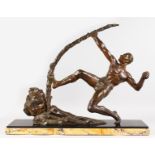 L. DAUTERIVE A BRONZE OF HERCULES PULLING A SAPLING. Signed, on a marble base. 22ins high x 26ins