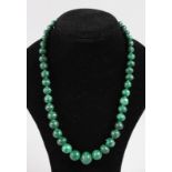 A MALACHITE BEAD NECKLACE (one broken).