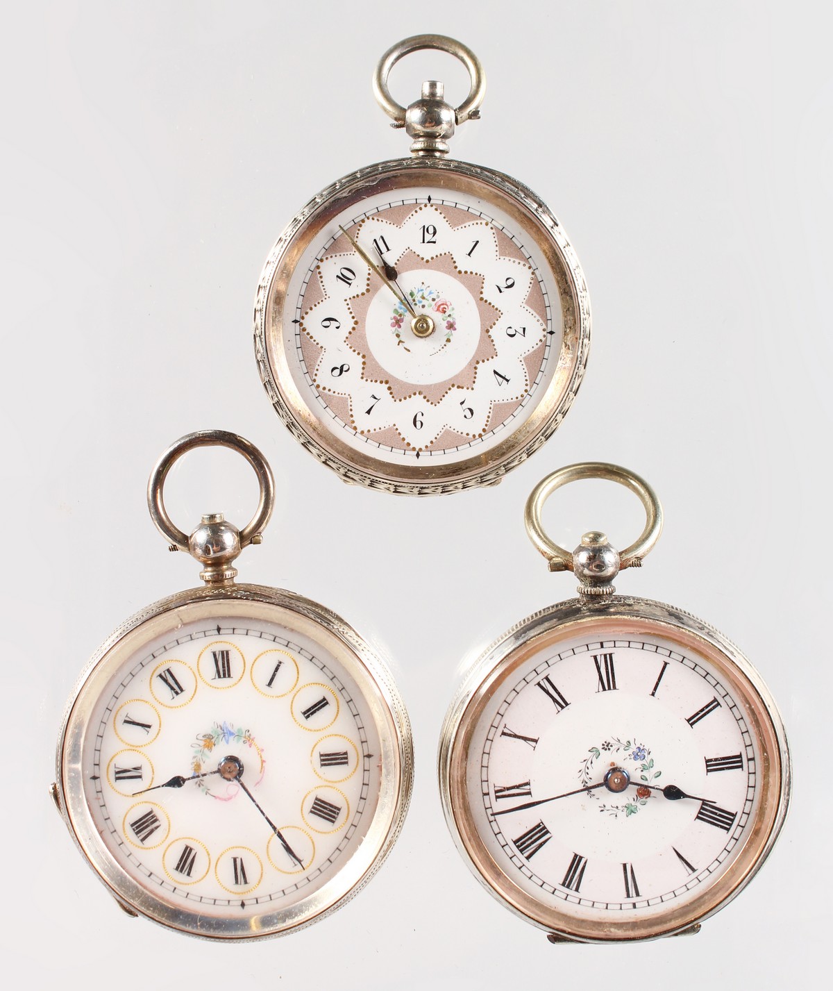 THREE ENGRAVED SILVER FOB WATCHES.