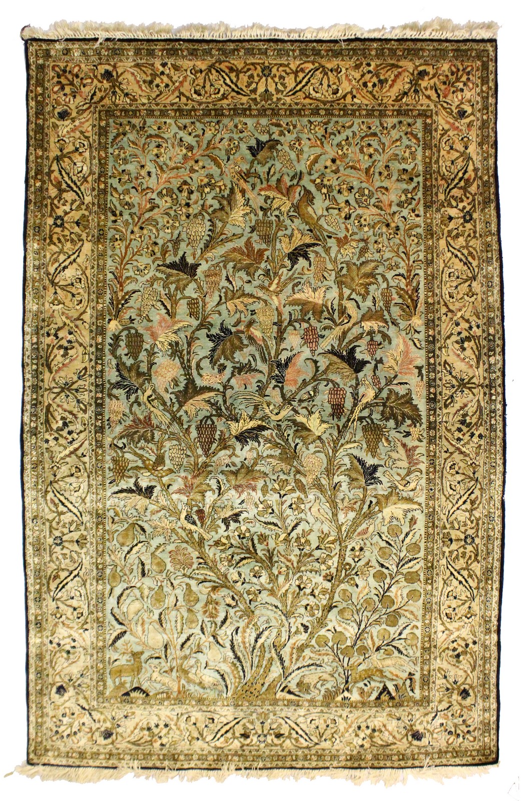 A PERSIAN SILK TREE OF LIFE RUG "EX LIBERTY". 7ft long x 4ft 8ins wide.