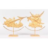 A MATCHED PAIR OF ORMOLU ARROW SCULPTURES. Stamped C.H., on a pedestal base. 9.5ins high.