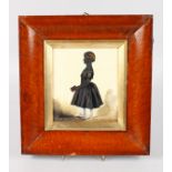 A VICTORIAN SILHOUETTE OF A YOUNG GIRL. 7.5ins x 6ins, framed and glazed.