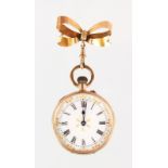 A LADIES FOB WATCH with 9ct gold bow.