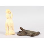 A BRONZE LIZARD, 4ins long, and an African bone figure, 4.75ins high (2).