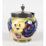 A RARE MOORCROFT MACINTYRE PANSY POTTERY JAM POT AND COVER, CIRCA. 1912, decorated with pale lemon