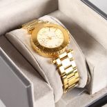 A GUESS WRISTWATCH AND BRACELET with papers in box.