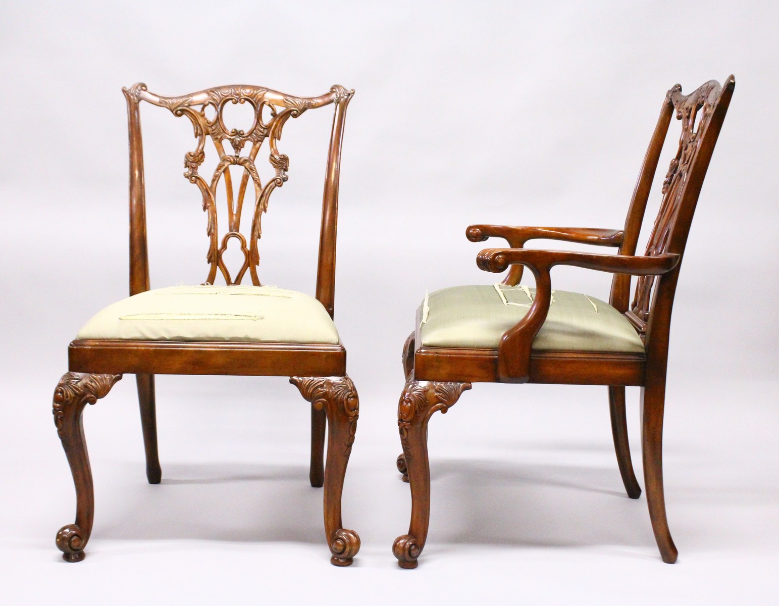 A GOOD SET OF TWELVE CHIPPENDALE STYLE MAHOGANY DINING CHAIRS, TWO WITH ARMS, with pierced vase