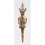 AN EARLY AFRICAN BRONZE FIGURE. 10ins long.