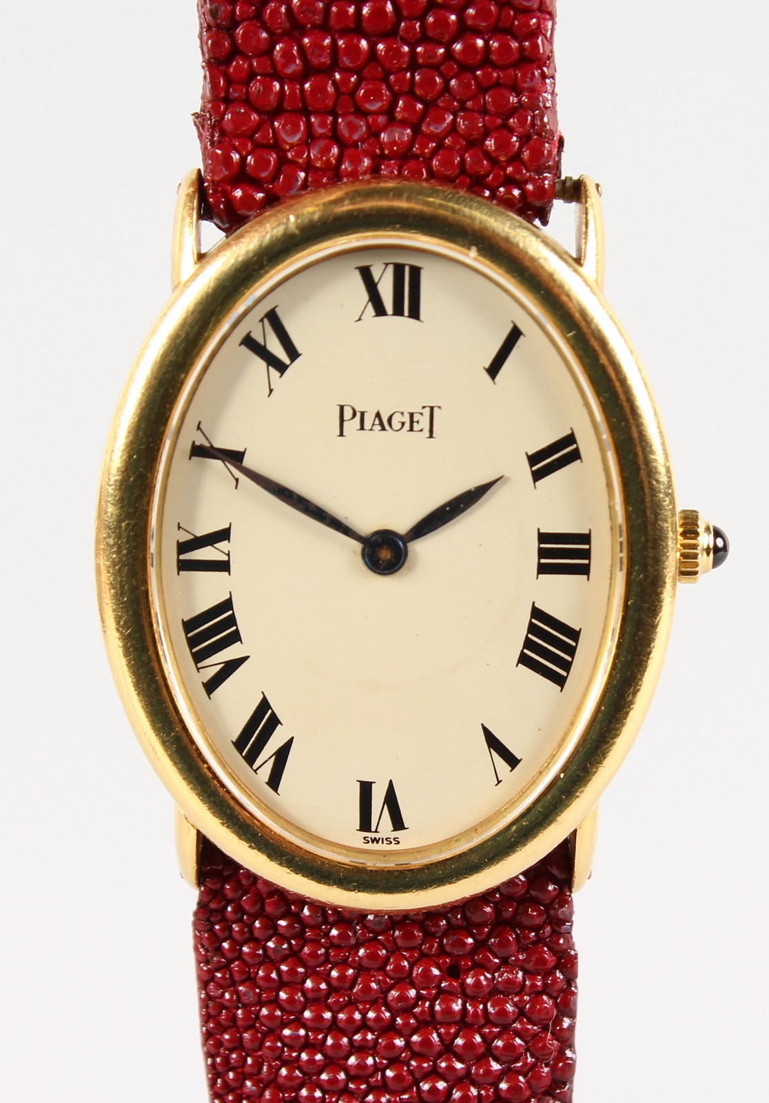 A LADIES 18CT GOLD OVAL PIAGET WRISTWATCH AND STRAP, No. 9862 142944.