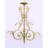 A FRENCH STYLE ORMOLU NINE LIGHT CHANDELIER, 20TH CENTURY, with rams head masks, foliate swags and