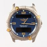 A GENTLEMAN'S STEEL AND GOLD CASED BREITLING "AEROSPACE" WATCH with blue face, lacking strap.