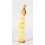 AN AFRICAN CARVED IVORY HORN "OLIPHANT" carved with a lizard. 10.5ins long.