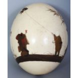 A SIGNED JAPANESE MEIJI PERIOD GOLD LACQUERED OSTRICH EGG, decorated with a boy flying a kite and