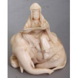 A SIGNED JAPANESE MEIJI PERIOD IVORY OKIMONO OF KWANNON, the deity seated on the back of an