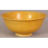 A GOOD CHINESE YELLOW GLAZED KANGXI MARK & PERIOD PORCELAIN BOWL, with a slightly everted rim, the