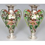 A GOOD PAIR OF CHINESE ENAMELLED SILVER VASES, circa 1900, each with pierced floral handles and