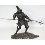 A LARGER JAPANESE MEIJI PERIOD BRONZE FIGURE OF A SAMURAI, standing with a Naginata type halberd