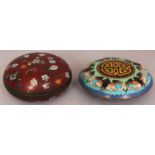 A 19TH CENTURY JAPANESE MEIJI PERIOD RED GROUND CIRCULAR CLOISONNE BOX & COVER, 3.6in diameter;