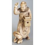 A GOOD QUALITY SIGNED JAPANESE MEIJI PERIOD IVORY OKIMONO OF SHOKI THE DEMON QUELLER, standing and