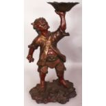 A LARGE JAPANESE MEIJI PERIOD BRONZE FIGURE OF AN ONI, standing on a wave-form plinth and supporting